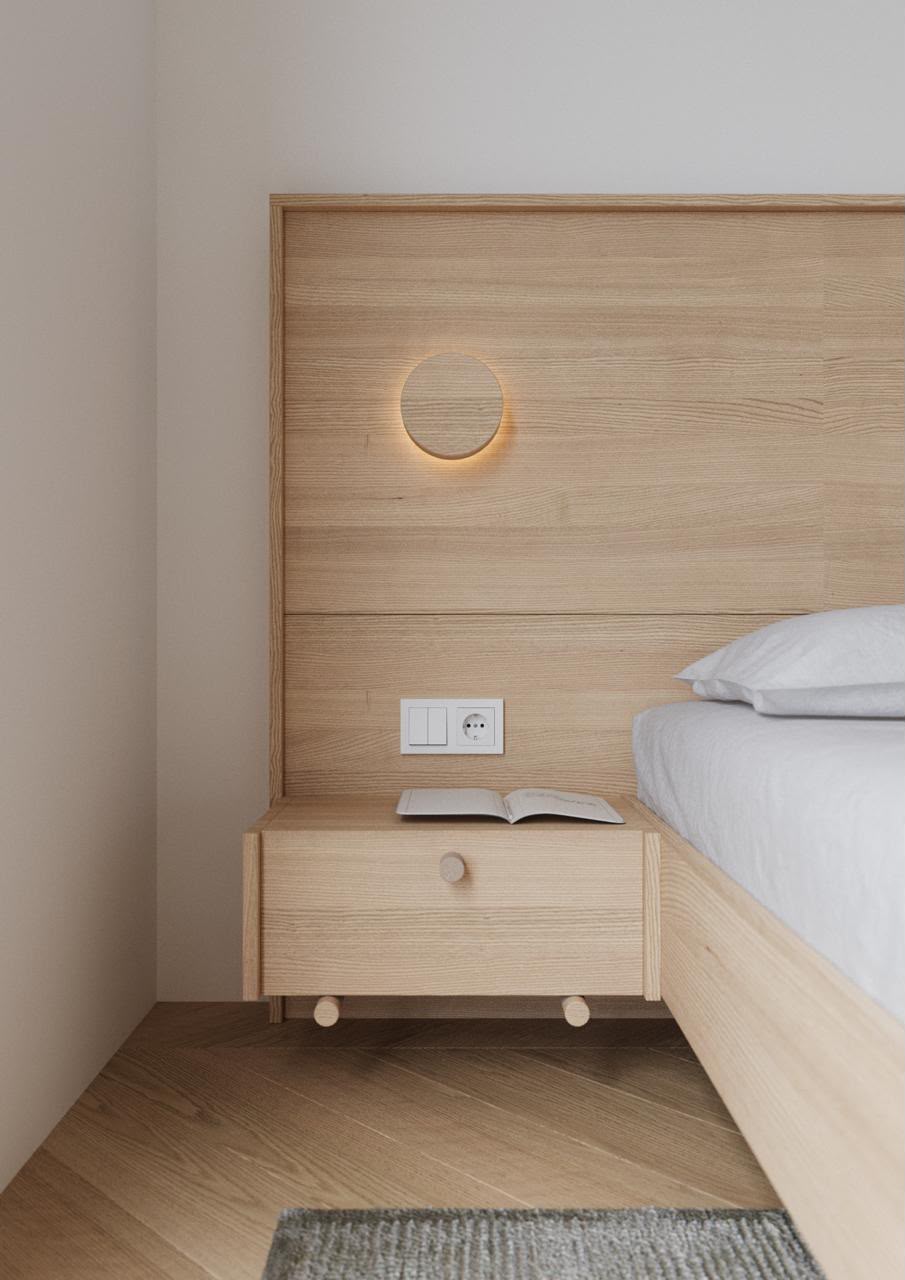 Light wood bedside panel with integrated nightstand storage
