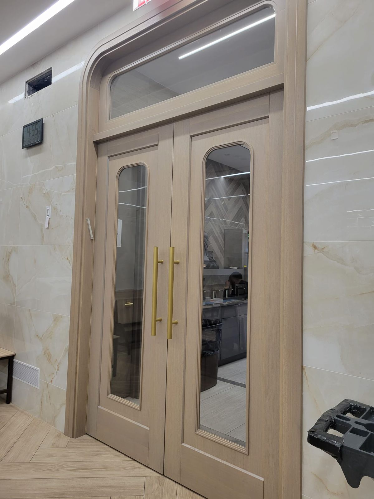 Custom entry doors with gold handles
